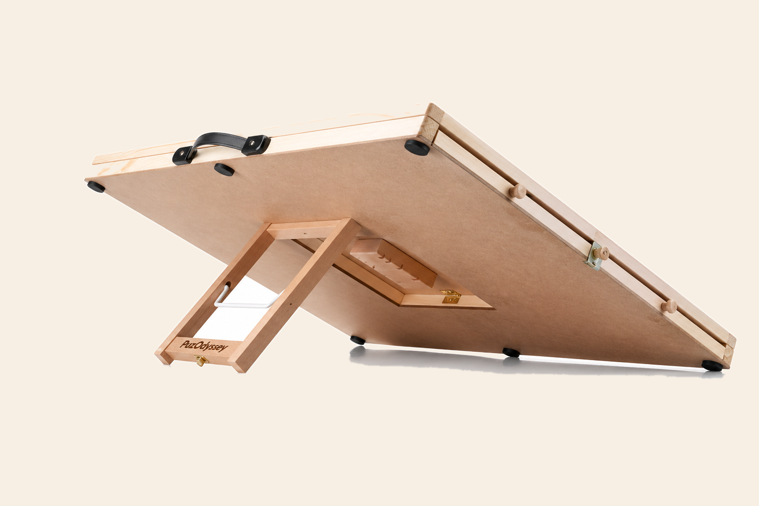 The PuzOdyssey wooden puzzle board with its rear tilt support